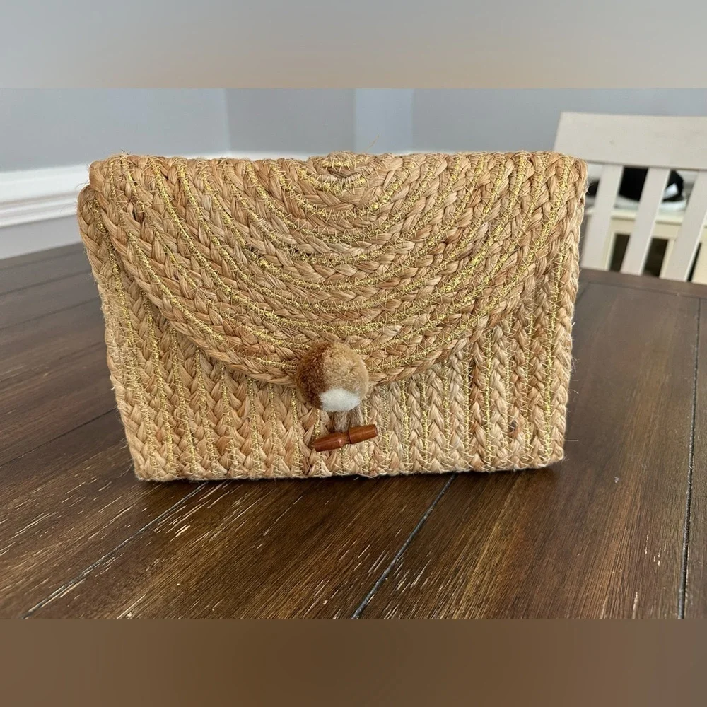 America & Beyond handwoven clutch